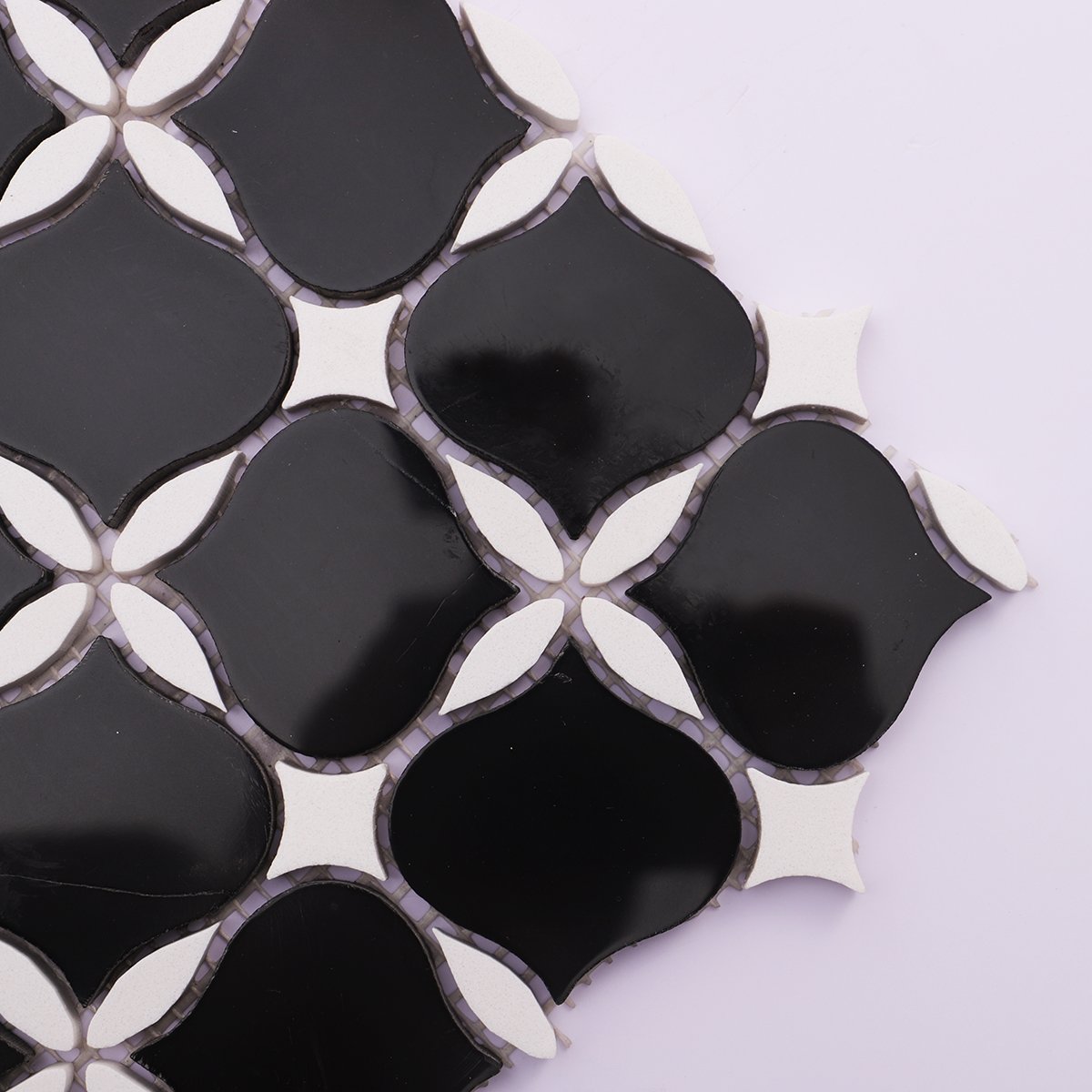 Detailed view of black and white stone mosaic tiles