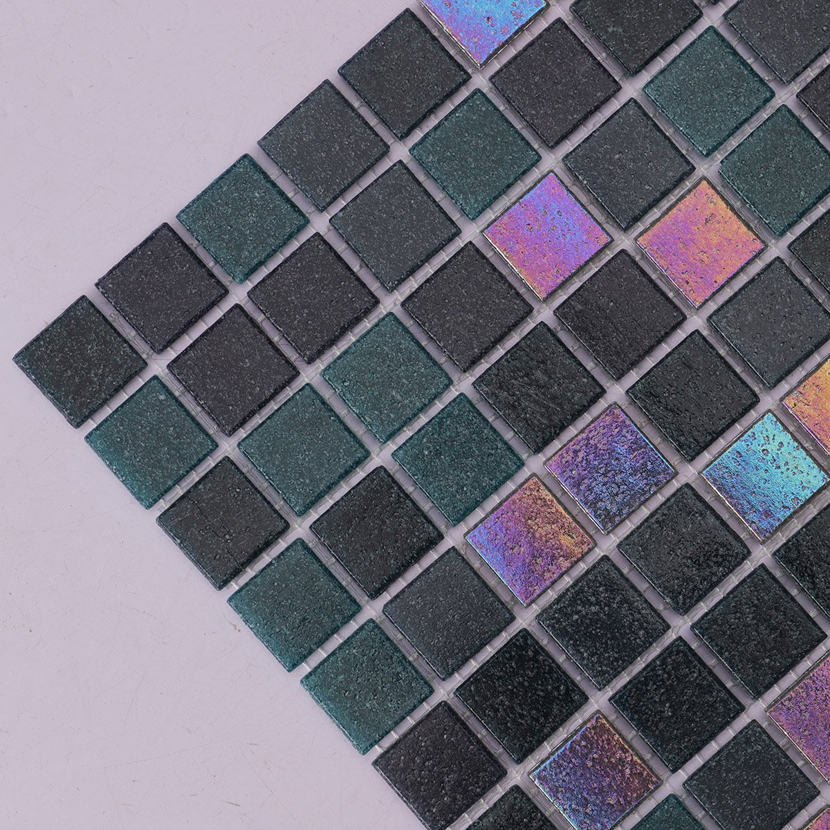 Detailed side close-up of black mix bottle green glass mosaic tile