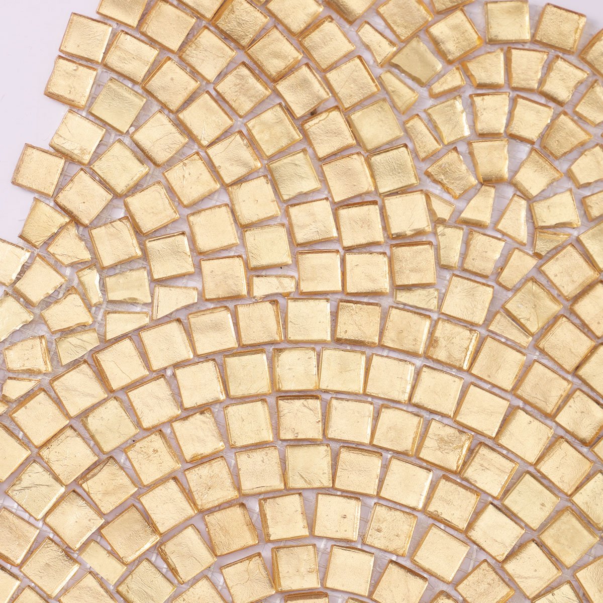 Close-up view of gold glass mosaic art designs