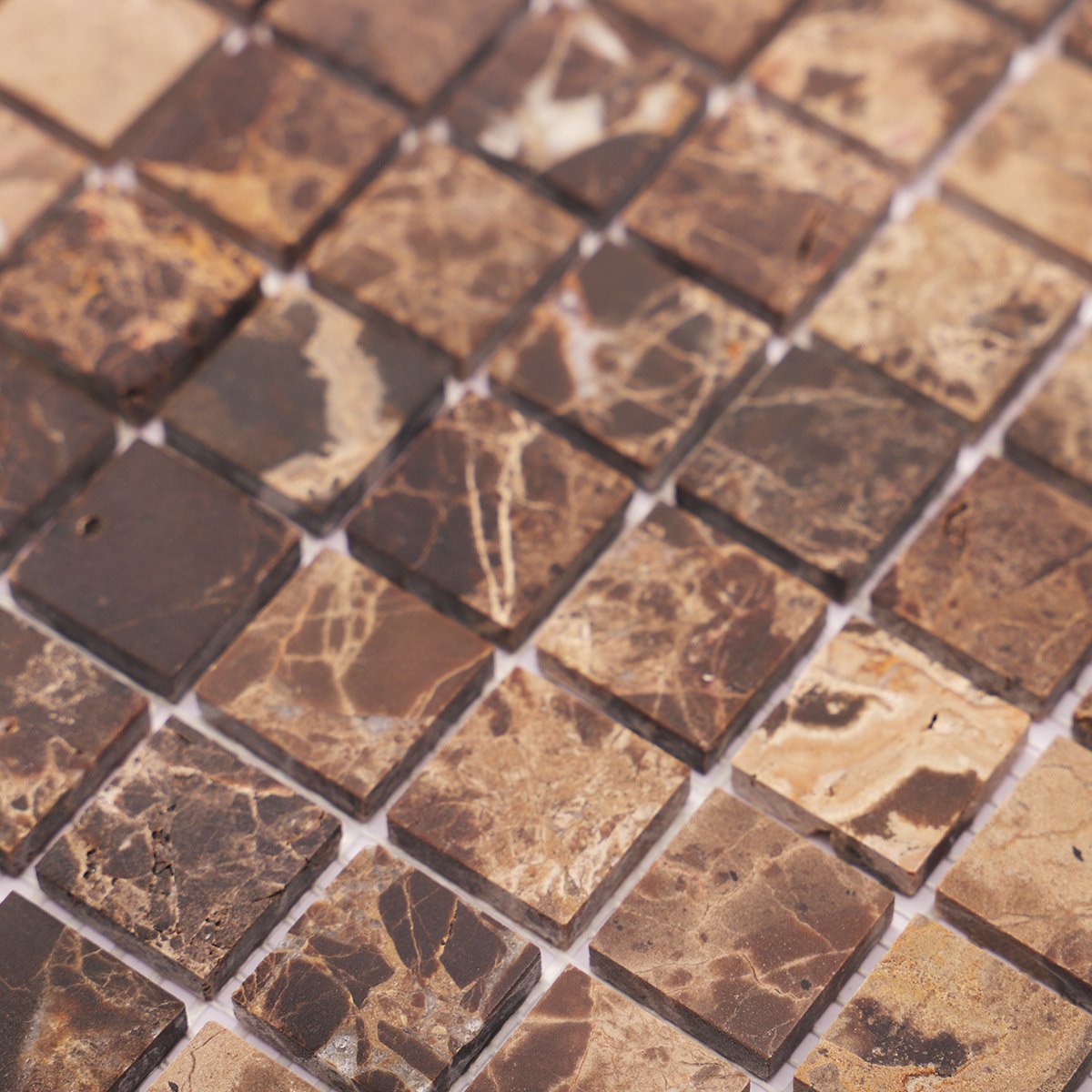 Detailed close-up of dark brown mosaic marble tiles