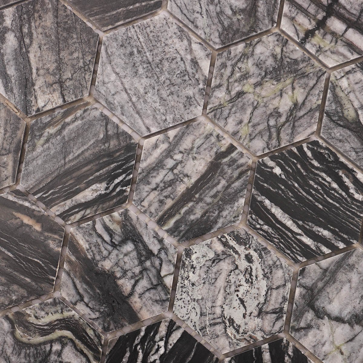 Close-up view of dark grey hexagon marble mosaic tiles