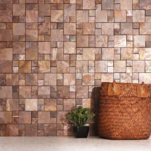 3D copper metallic mosaic tile on a living room wall.