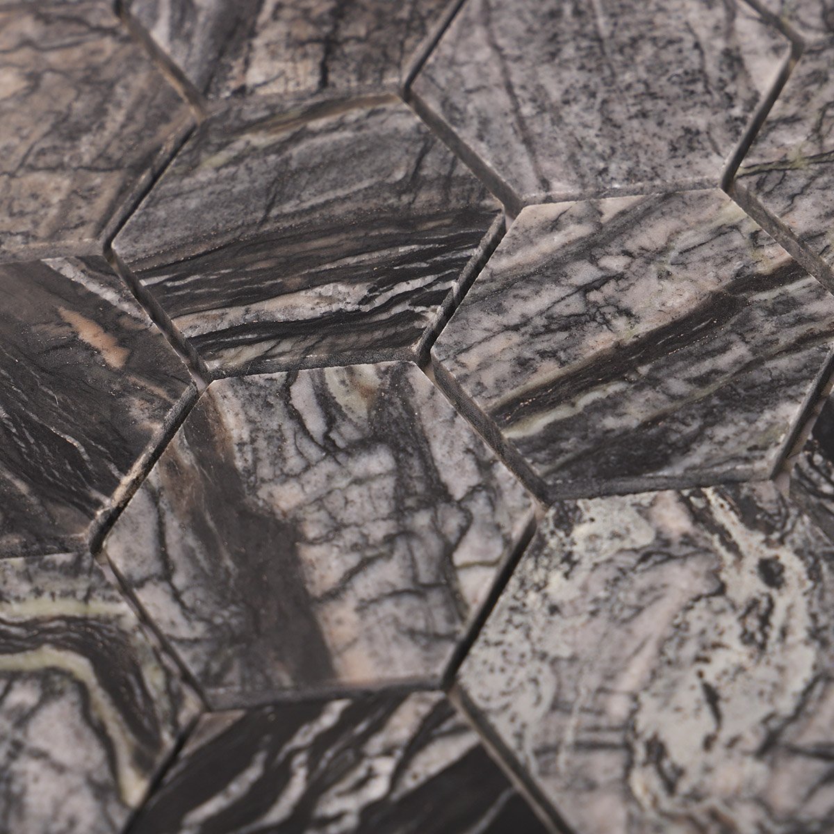 Close-up of dark grey hexagon marble mosaic tiles