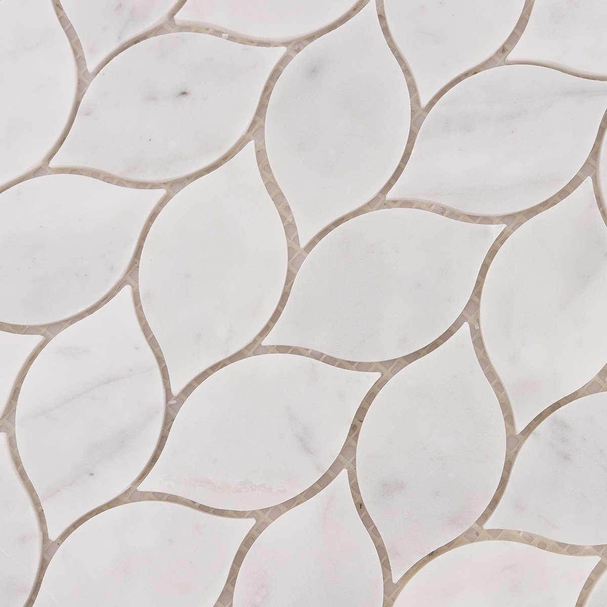Close-up of Carrara white leaf marble mosaic tiles