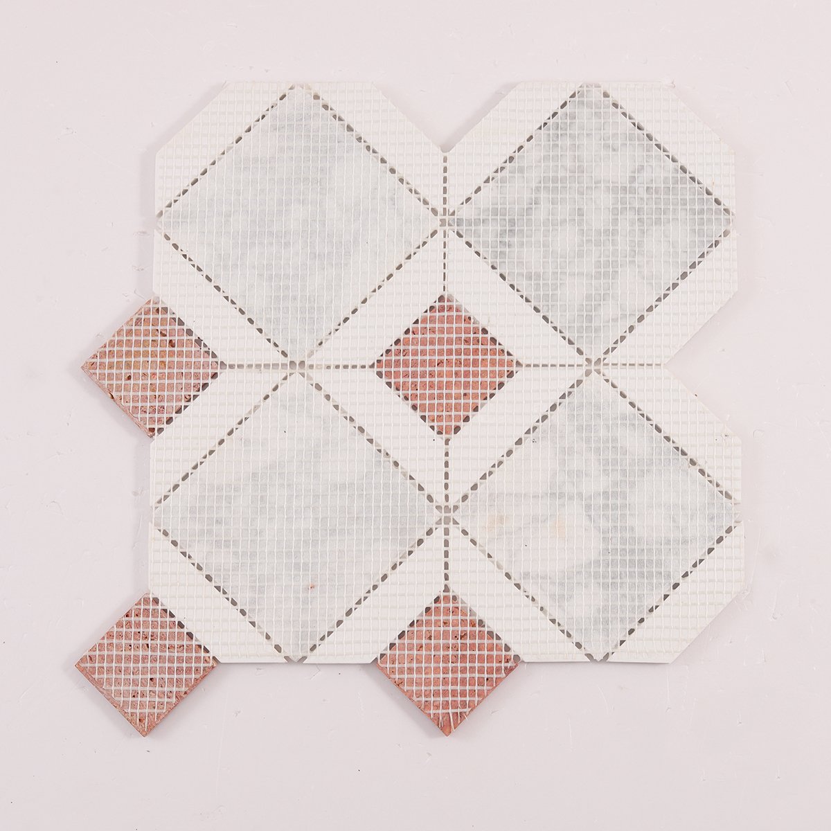 Back side of White and Red Polished Marble Mosaic Tiles, folded.