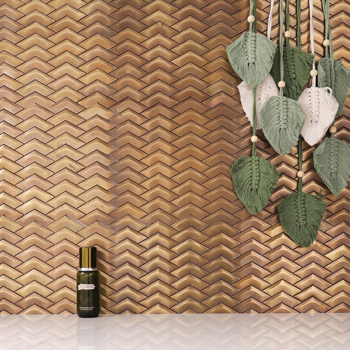 Chevron Brass Metal Mosaic Wall Tile on the wall, paired with white floor tiles, modern and stylish