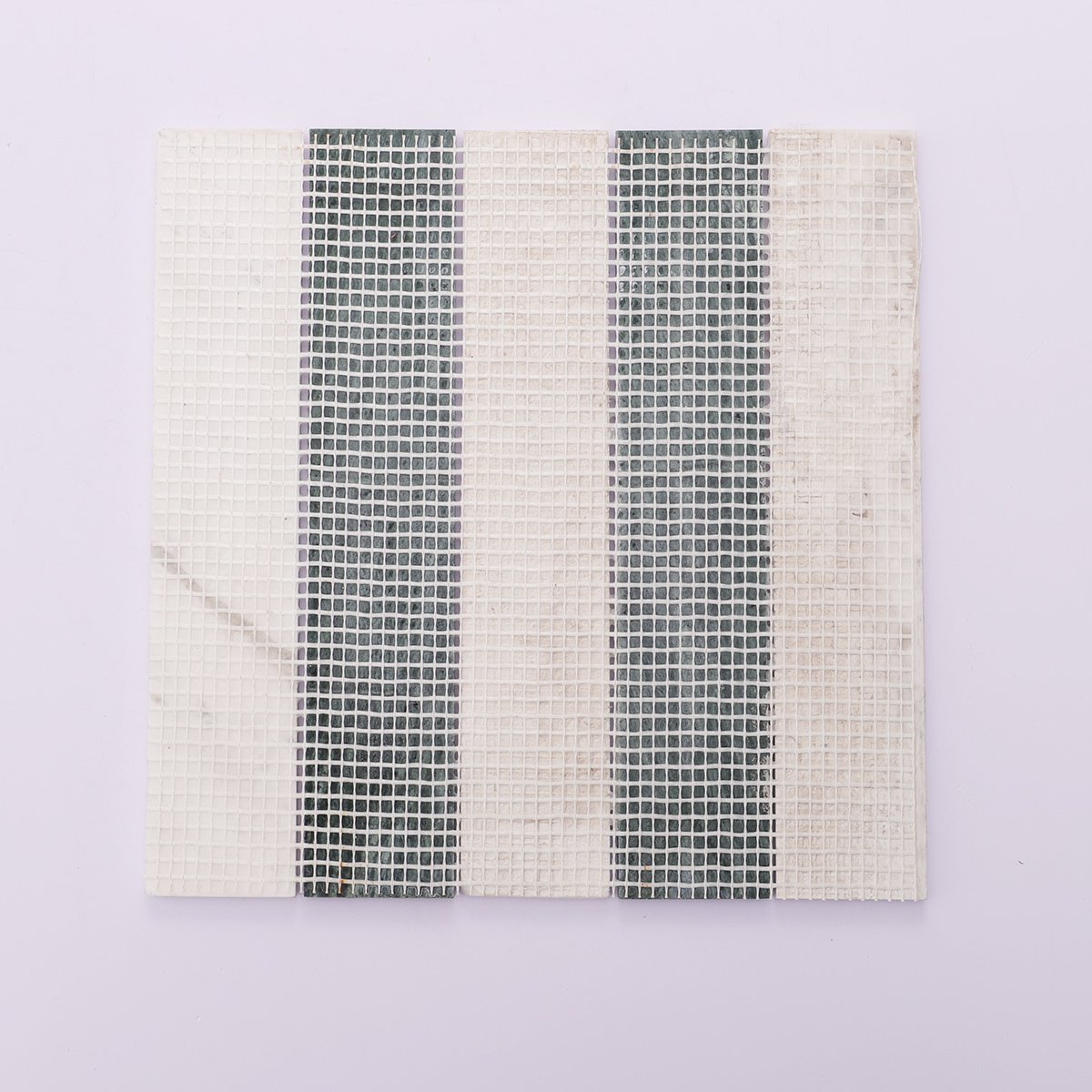 The back of the tile showing the mesh for easy installation.