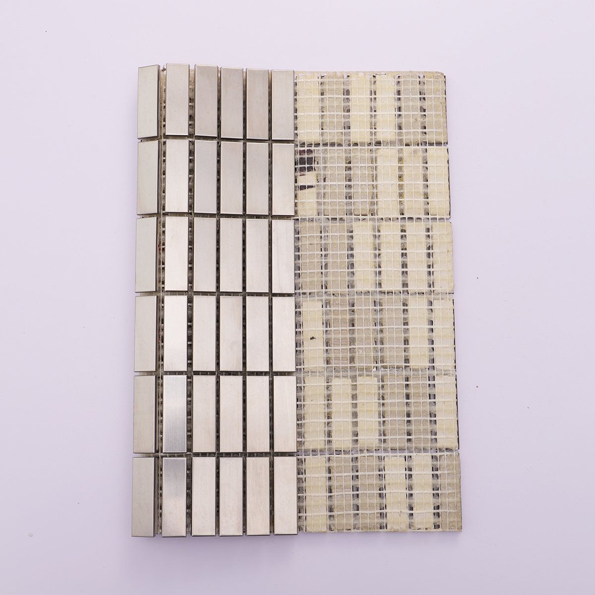 Back view of brushed stainless steel rectangle tiles