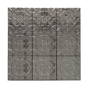 Straight-on view of a glossy black embossed floral metal mosaic tile sheet.