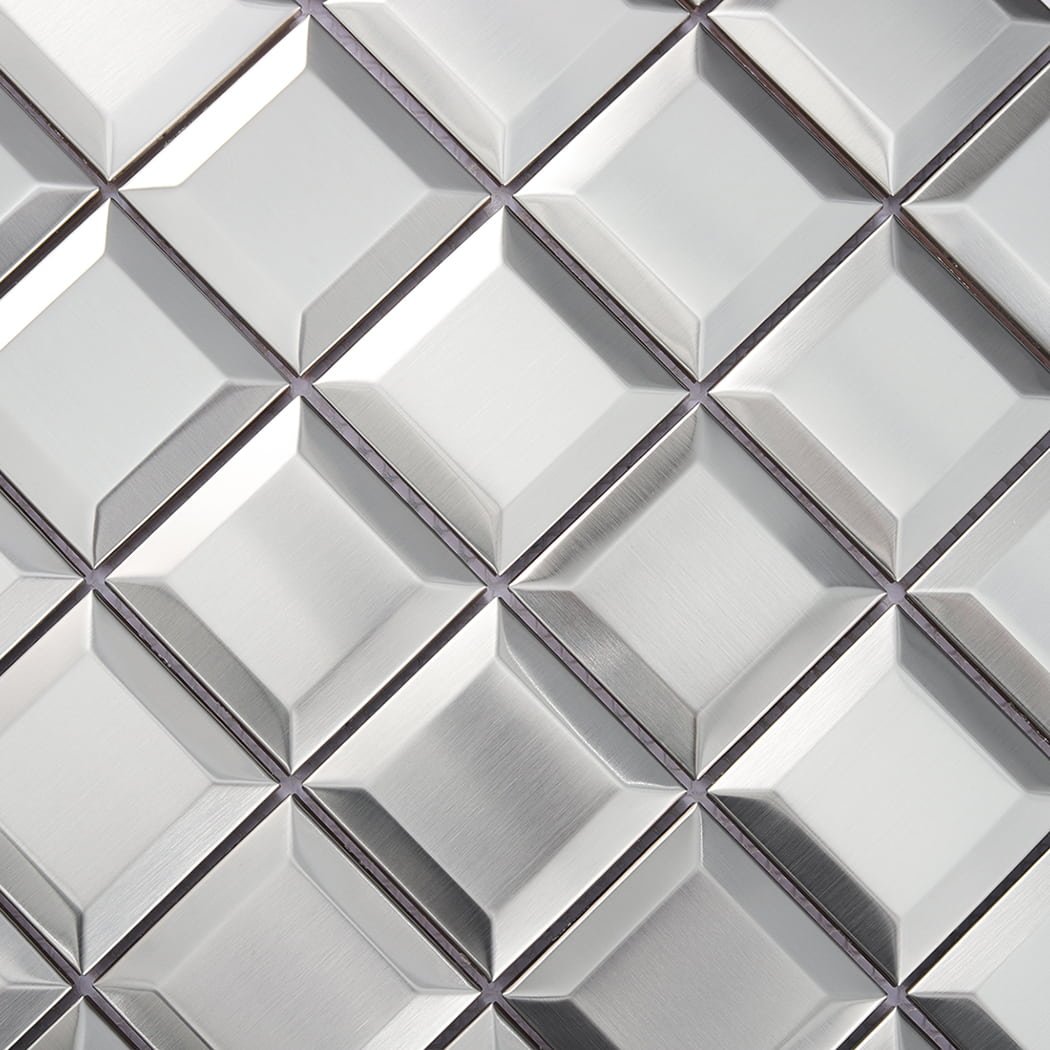 Detailed view of brushed silver beveled stainless steel mosaic tile surface