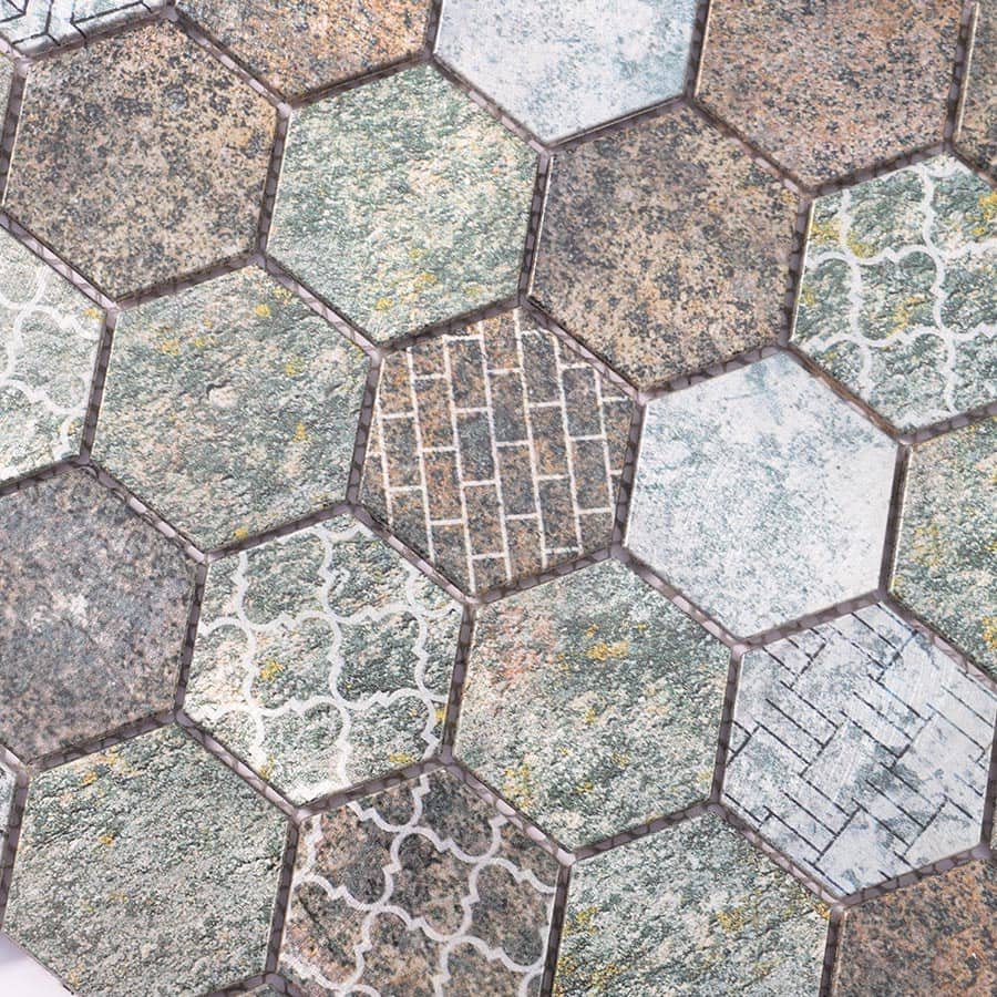 Macro view of hexagonal mosaic tiles with rustic stone textures and embossed graphic patterns.