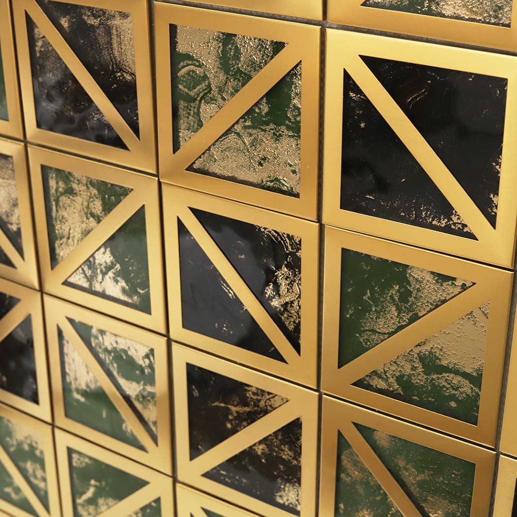 Side view of a tiled wall showing the glossy reflection and metallic gold finish.