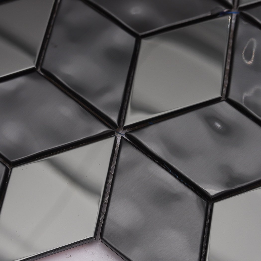 Vintage mosaic tile in black with a dimensional cube pattern