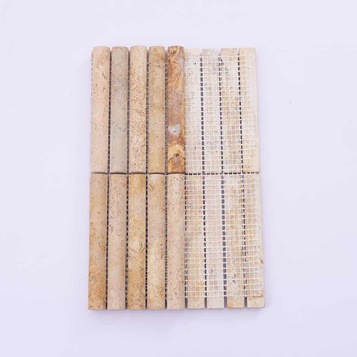 Backside of beige fluted travertine mosaic with mesh backing