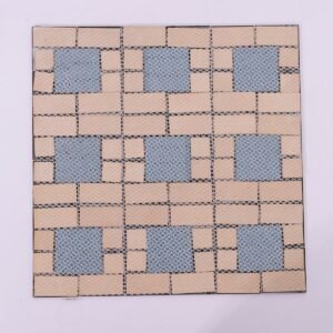 3D-mosaikplatta i svart rostfritt stål och guldglas
