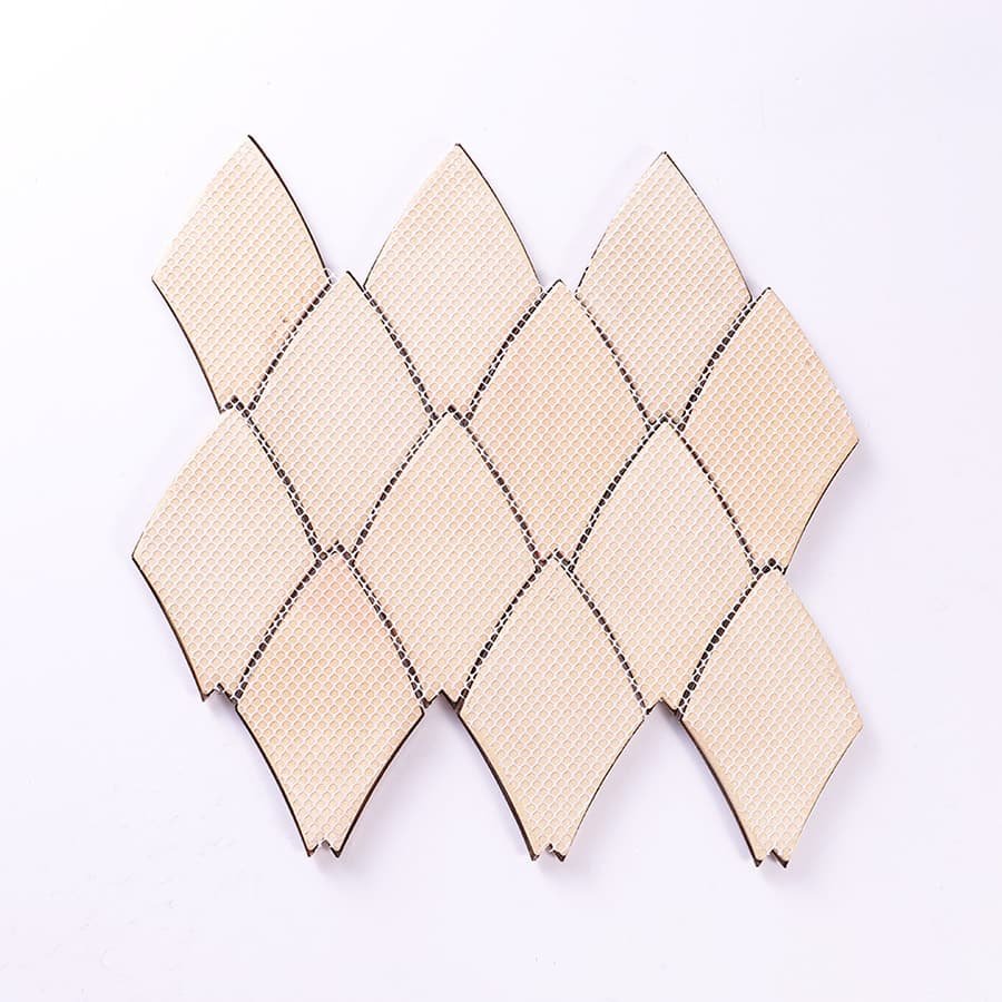 Back view of copper diamond mosaic tile showing mesh backing design.
