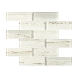 Cream white glass subway tile in staggered brick pattern with soft gray veins
