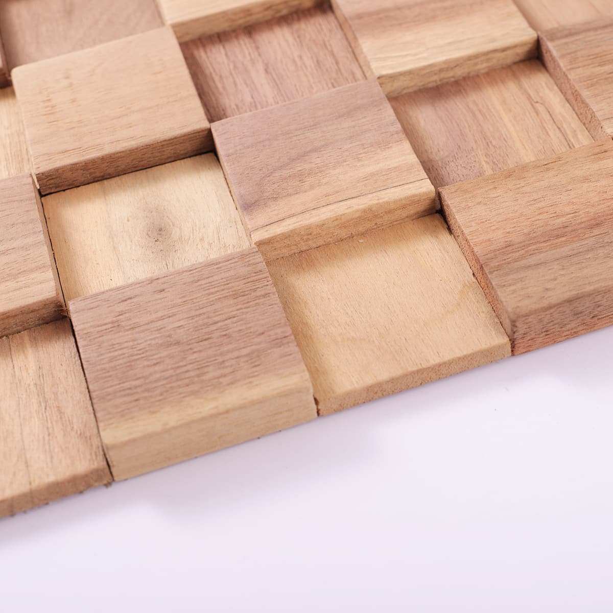 Side view of raised cube wood tiles with layered surface