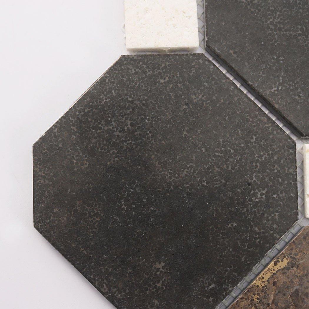 Close-up of deep brown octagon mosaic tile with natural speckled texture