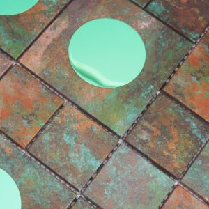 Väggmosaik i bronsfärgad aluminium med detaljer i mintgrönt glas
