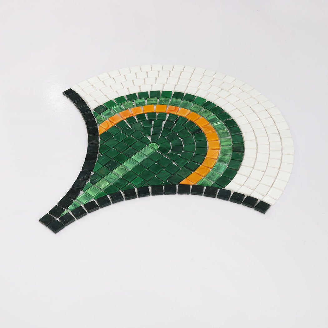 Angled top view of a fan-shaped glass mosaic tile on a white background.