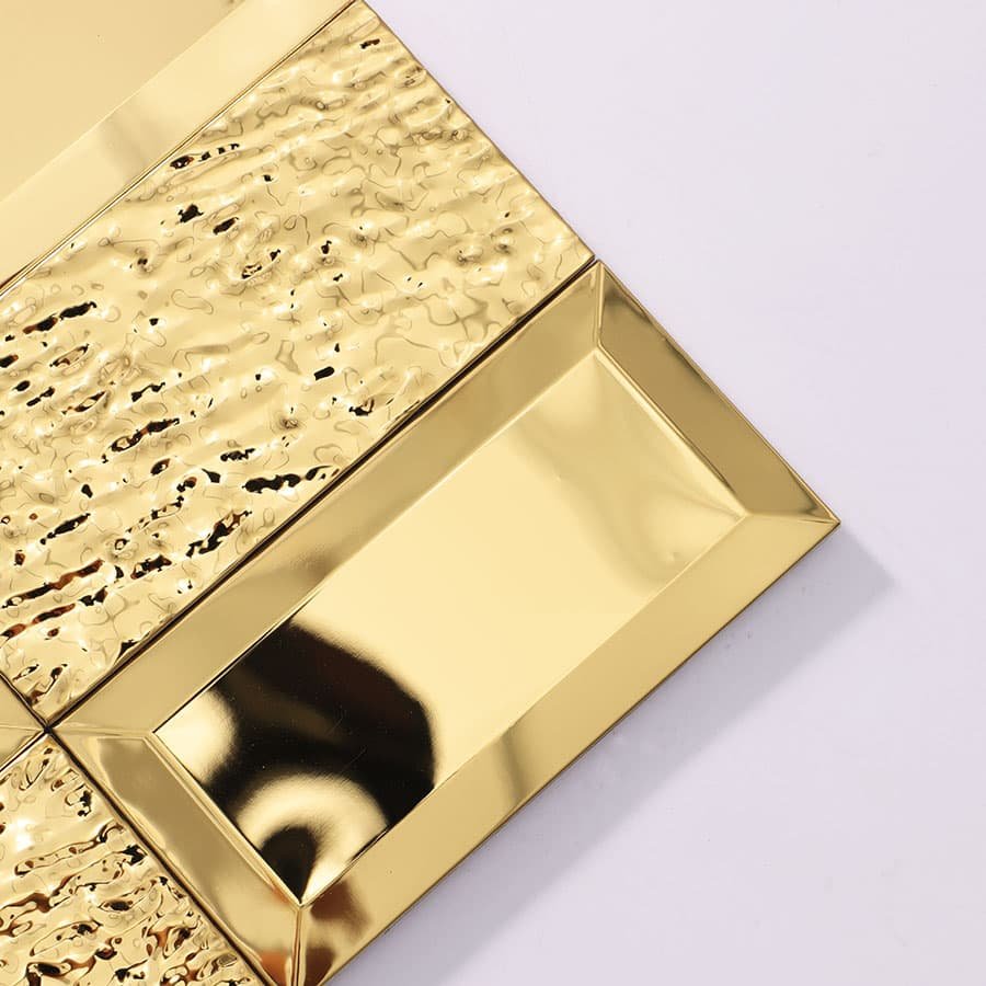 Closeup of gold beveled rectangular wall tile