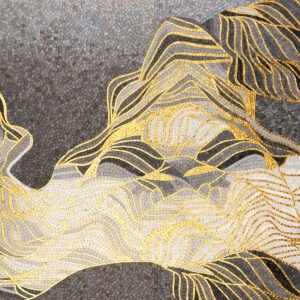 Close view of gray and gold abstract mountain glass mosaic mural