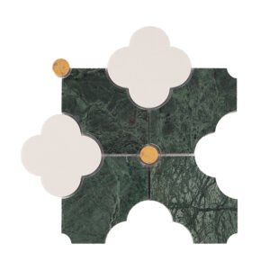 Front view of green marble tile with white clover shapes and gold circles.