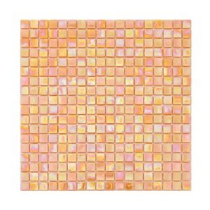 Full sheet of pearlescent orange square glass mosaic tile on a light background