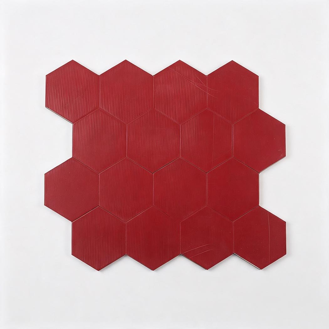 Red peel and stick adhesive backing on ocean blue mosaic