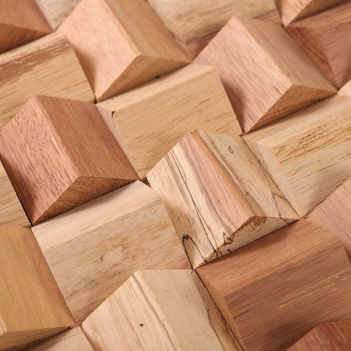 Close-up of 3D wood tile surface with sharp pyramid profiles