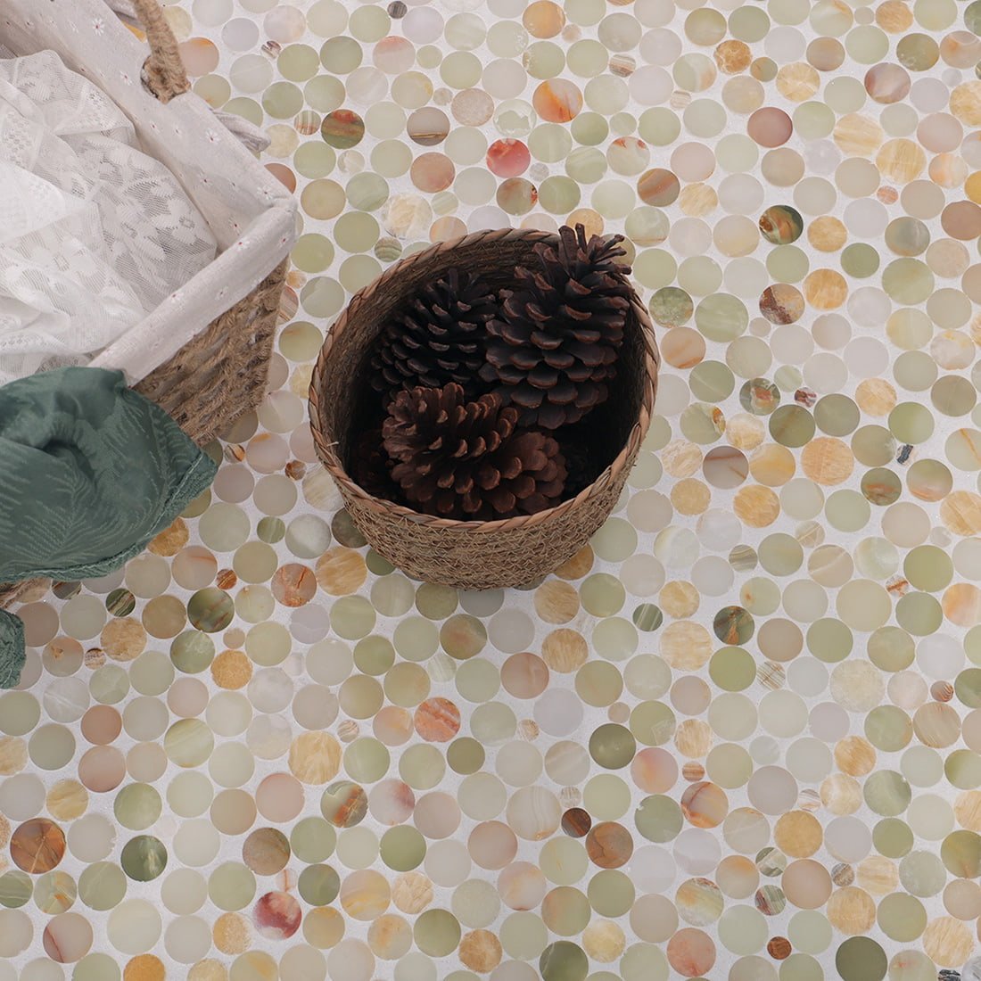 Beige green round marble mosaic floor with woven basket decor