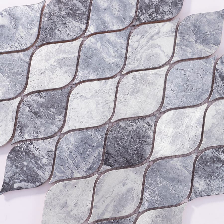 Diagonal angle view of silver gray aluminum leaf mosaic tile