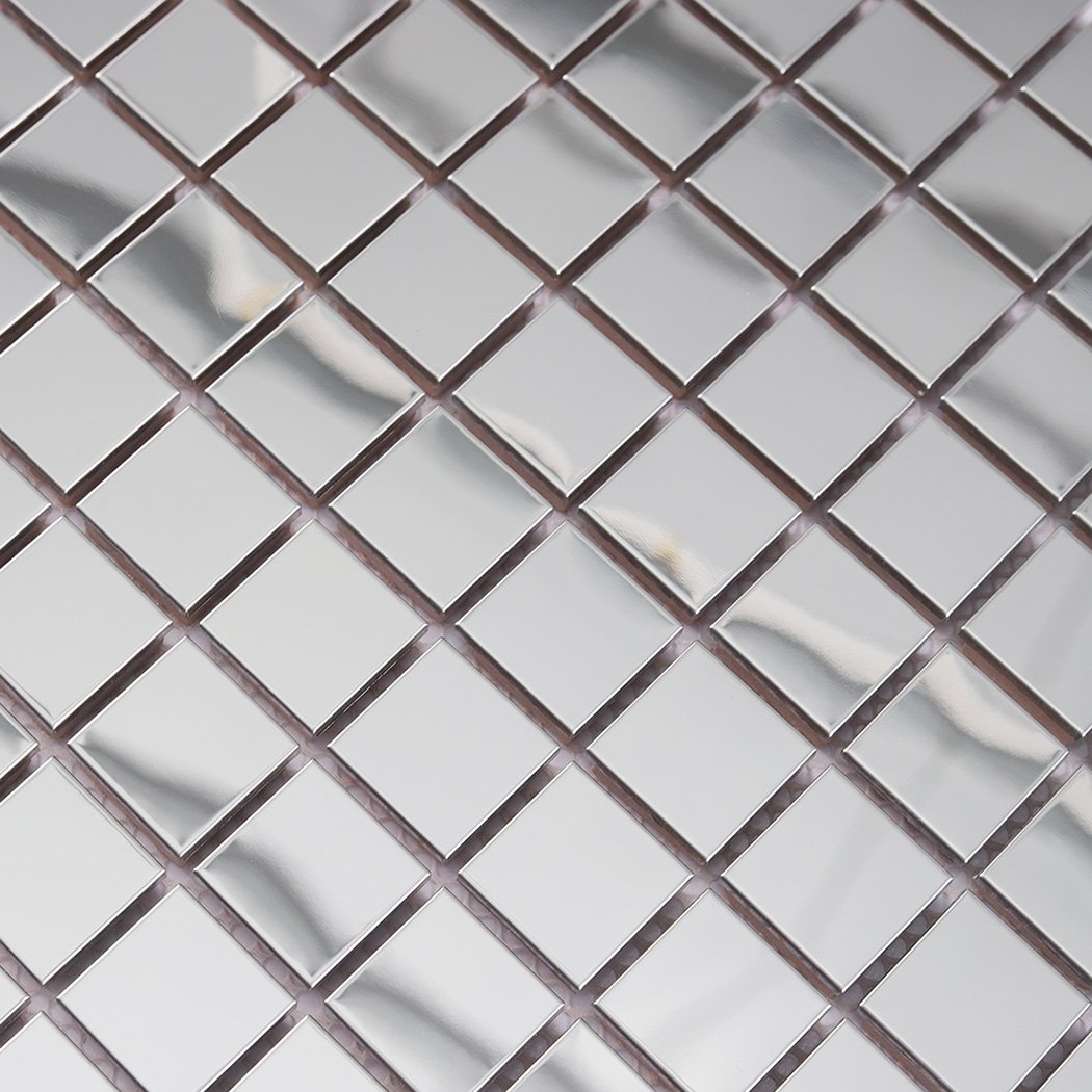 Close-up of silver mirror square mosaic tiles with smooth reflective finish