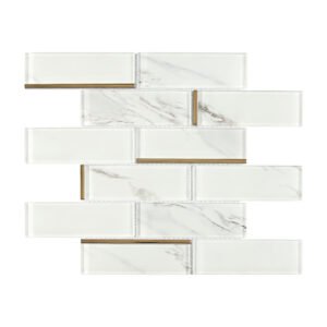 White marble glass subway tile in staggered pattern with slim gold line accents